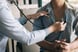 using a stethoscope listen to the heartbeat of patient
