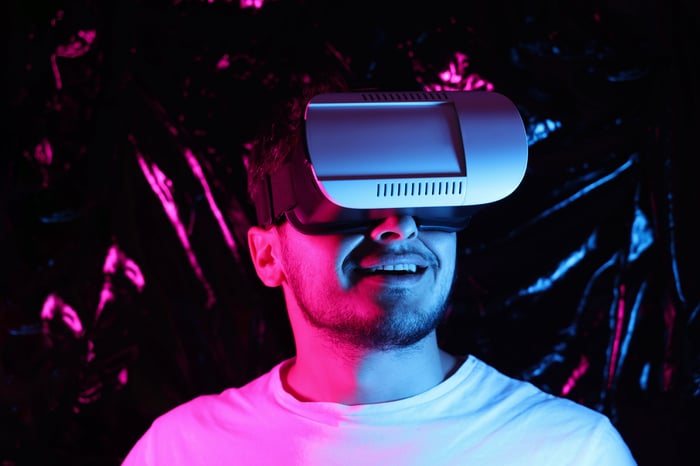 Gamer with VR headset.