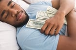 hugging money peace of mind sleep at night financial security