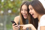 social media users watching videos on a smartphone