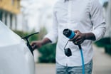 person with electric car