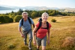 active couple outdoors hiking health fitness