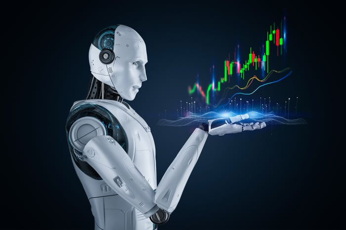 An artificial intelligence-driven robot analyzing a steadily rising stock chart displayed above its hand.