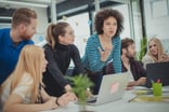 Team at an office debating ideas_GettyImages-1191131442