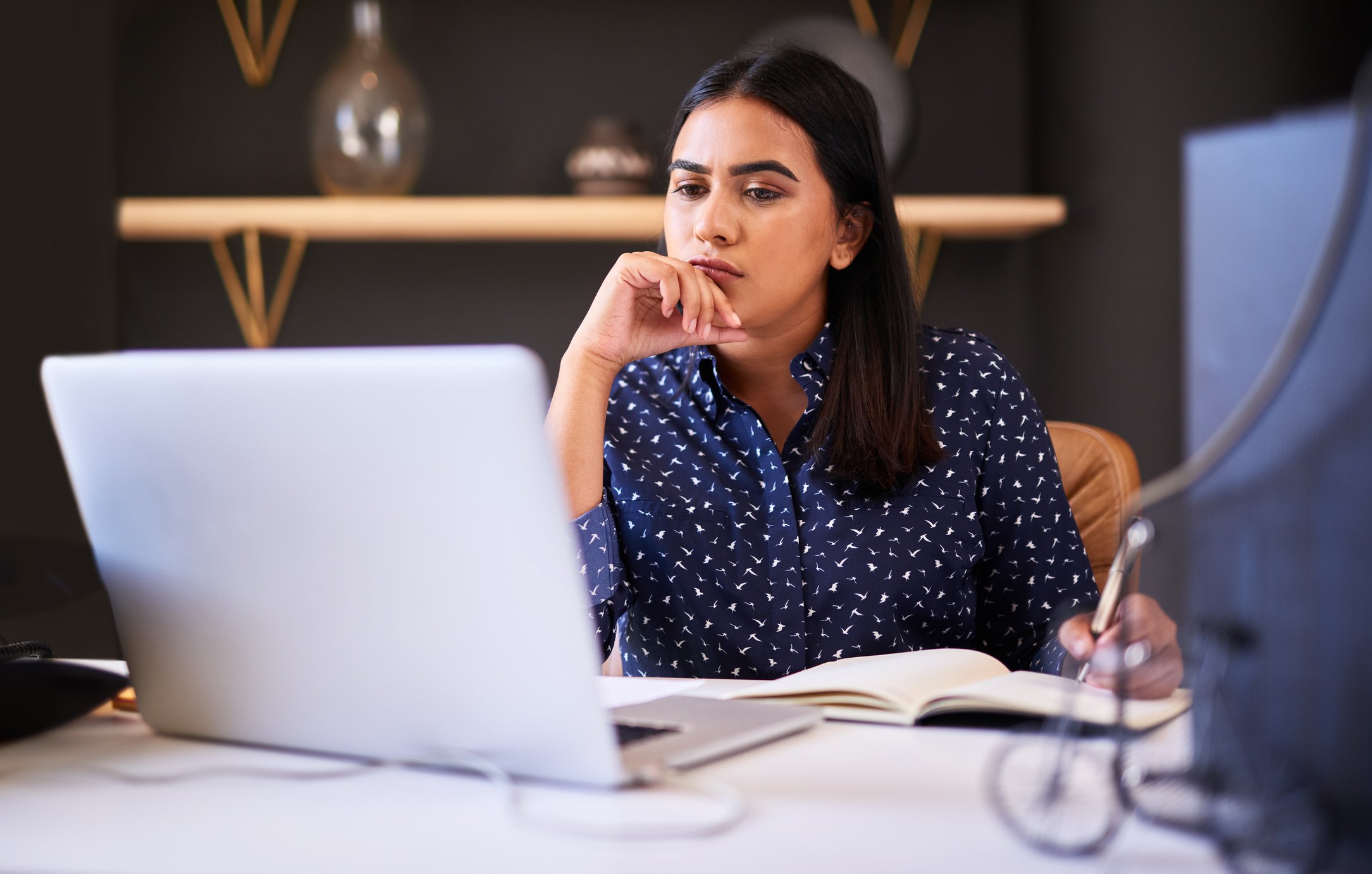 Woman 20s laptop GettyImages-1396321418