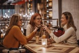 Three people drinking cola restaurant