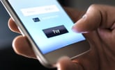 person paying with phone