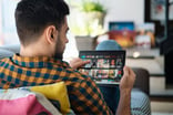 nflx stock earnings person streaming