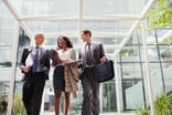People standing outside an office building -- GettyImages-521812077