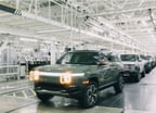 rivn stock earnings ev production