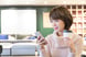 woman looking at smartphone