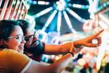Amusement_Park_Couple-GettyImages-1166230208