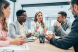 People sitting around a table in an office