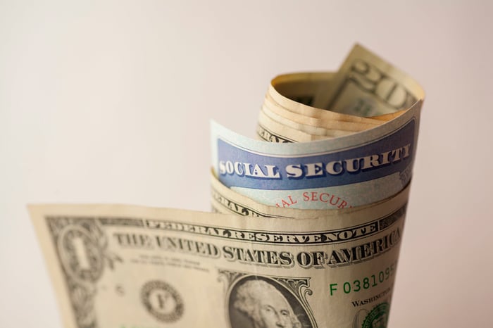 Social Security card inside a roll of cash.