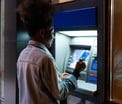 Customer at a Bank ATM -- GettyImages-1081379790