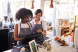Two people in a small business