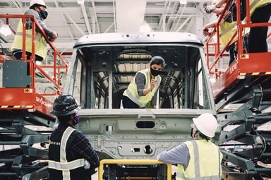 rivian manufacturing delivery van EV normal illinois plant source rivian