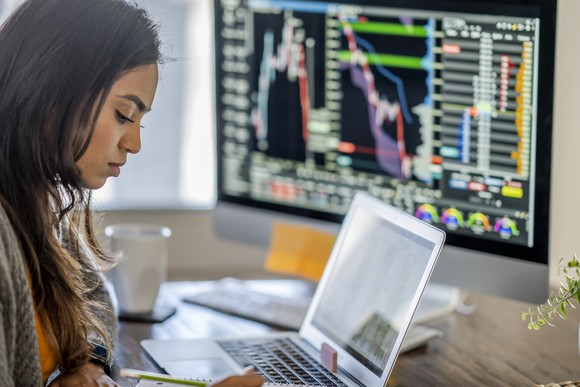 Individual investor looking at stock charts.