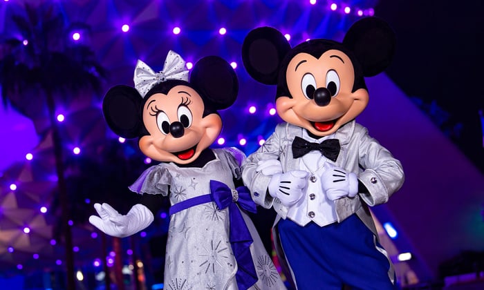 Mickey and Minnie Mouse dressed up.