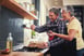 21_07_28 Older couple adding spices to cooking food _GettyImages-815699668