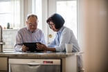 two people using a tablet