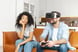 virtual reality headsets couple on couch