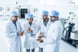 A team of scientists reviewing results in a lab.