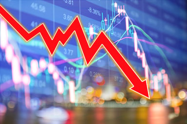 A chart line and arrow moving down.