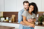 Getty - couple happy in kitchen-1200x798-36b7a2e