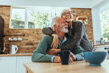 Senior couple happy embracing GettyImages-1125719715