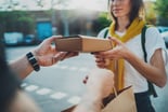 Person delivering a box to a person