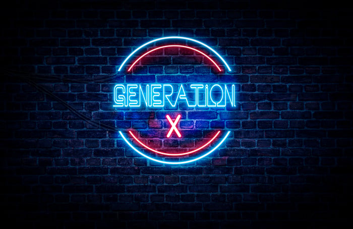 Neon red and blue sign on brick wall reads: Generation X.
