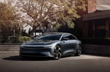 Lucid_Air_Pure_Hamptons_w_talent_house_frt_3qtr_AeroLt_20in_G_E2_no talent_social