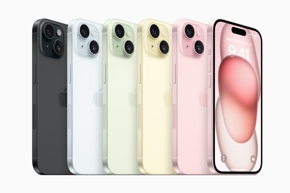 Six iPhones in various colors lined up side by side.