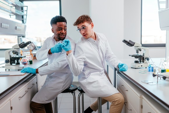Two scientists working in a lab.