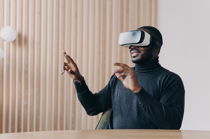 A person using VR goggles.