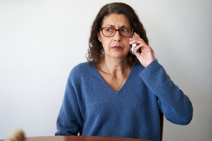 Person talking on cell phone.