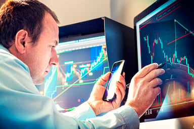 Stock Trader Analyst Fund Manager Buy Sell Chart Decline Bear Market Smartphone Getty