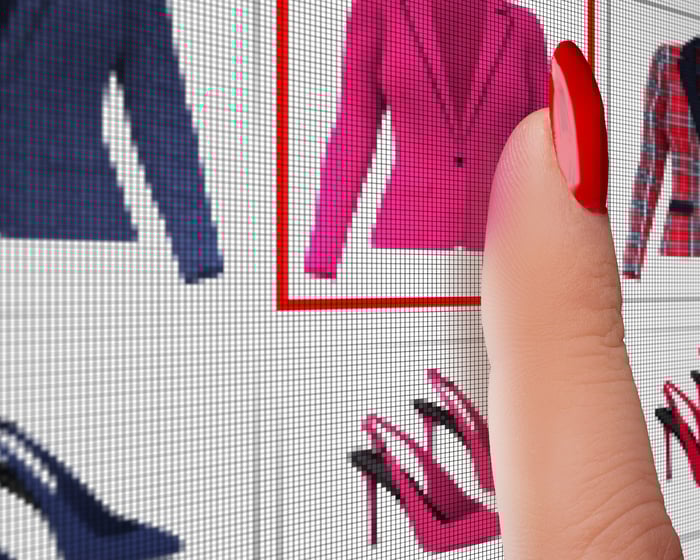 Woman shopping online for clothes.