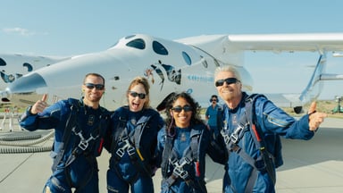 Sir Richard Branson and crew after landing from Virgin Galactic's test flight July 11