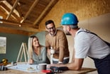 A couple building a house