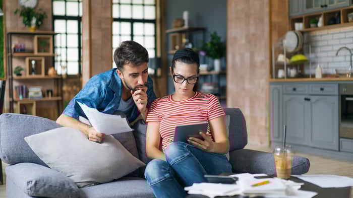 Couple reviewing finances together.