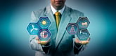 A person holding energy industry icons in their hands.