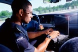 Policeman in vehicle