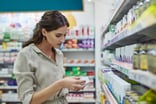 Person shopping at a pharmacy.