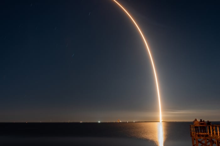 Long exposure photo of a SpaceX rocket launch.
