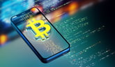 An image of Bitcoin on a phone.