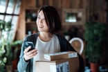 Person holding boxes