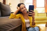 A person looking at a phone
