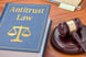 an antitrust book with a gavel getty